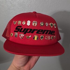 Brand New with Tags Supreme Pins Mesh Back 5 Panel Red Trucker Cap Gold Accents.